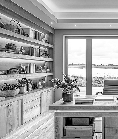 custom-home-office-design-largo-Florida Custom home office with built-in desk, file drawers, and wall shelving in Largo, Florida