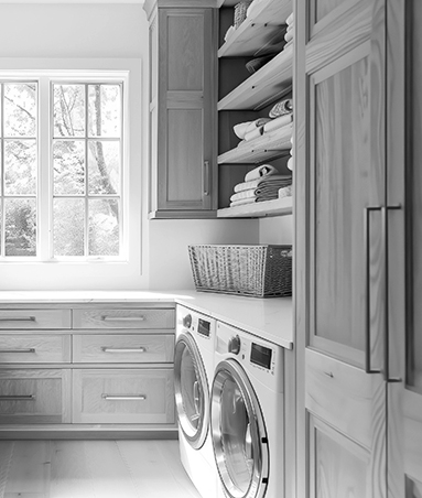 laundry-room-cabinetry-largo-FL Custom laundry room with built-in cabinets, folding surface, and wall-mounted drying rod in Largo, FL