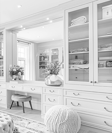 soho-custom-vanity-cabinetry-florida SoHo custom bathroom vanity with built-in drawers, floating cabinetry, and mirror in a Florida home